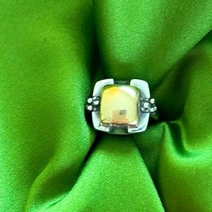 Michael Dawkins Ring that fits well with Yurman or Lagos